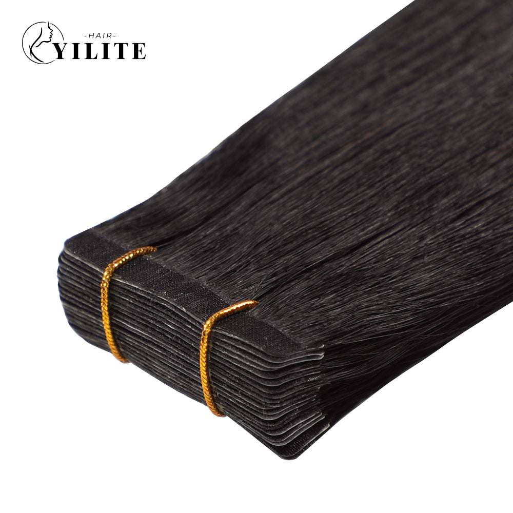 Close-up of narrow seamless injected Hand-Tied mini invisible tape in hair extensions (#1B)