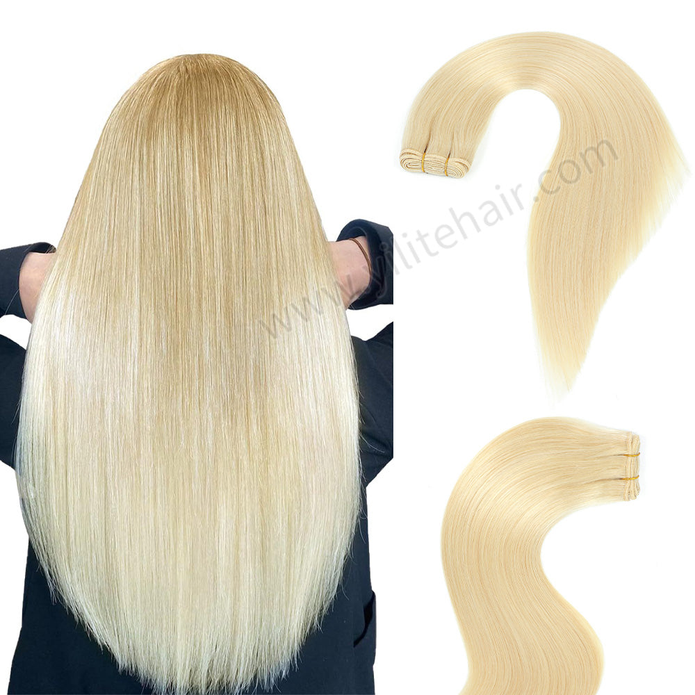 Realmhair #60 Platinum Blonde sew-in weft hair extensions shown in full back view           