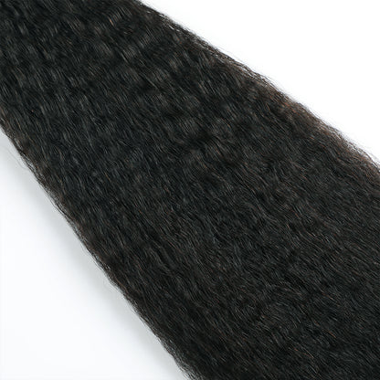 Close-up of Realmhair Kinky Seamless Injected Invisible Tape-In Hair Extensions (#1 Jet Black)